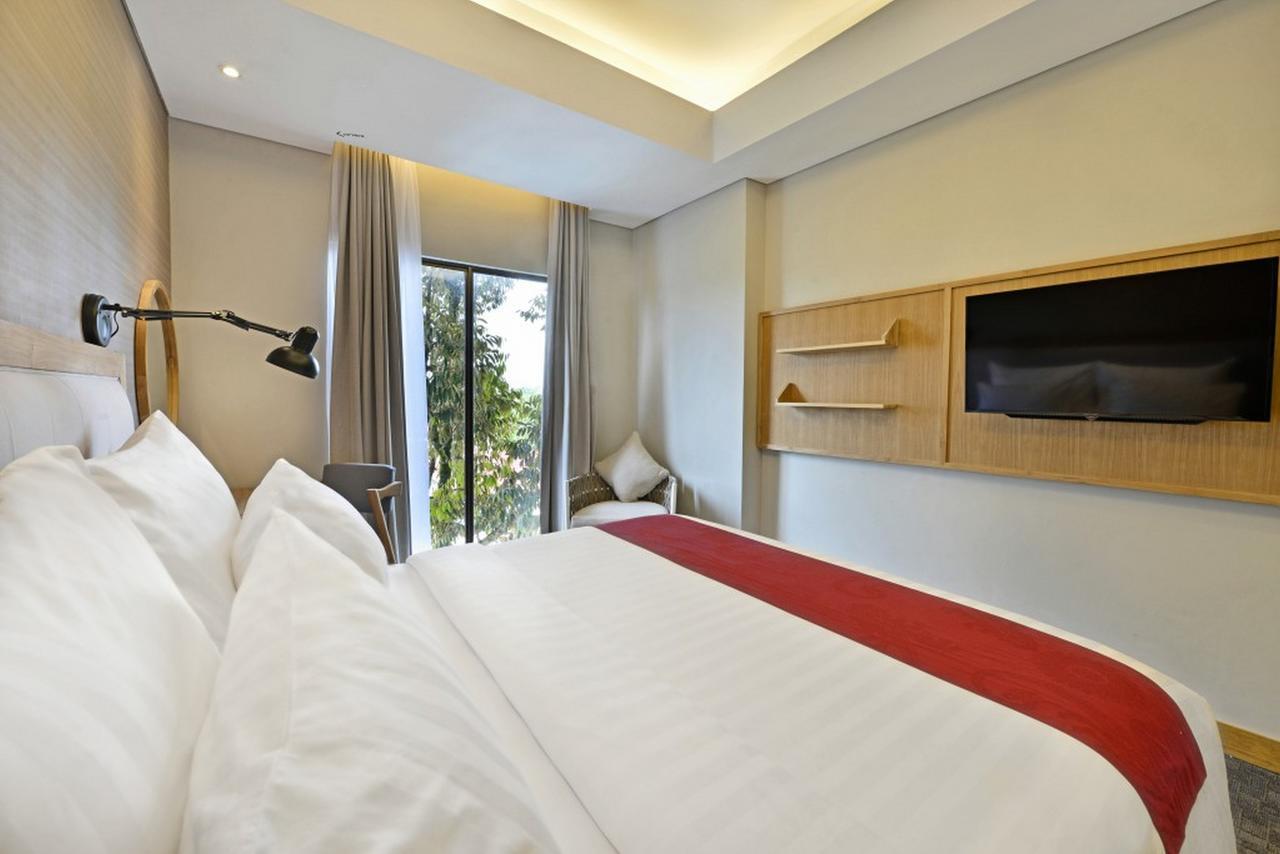 Famvida Hotel Lubuklinggau Экстерьер фото